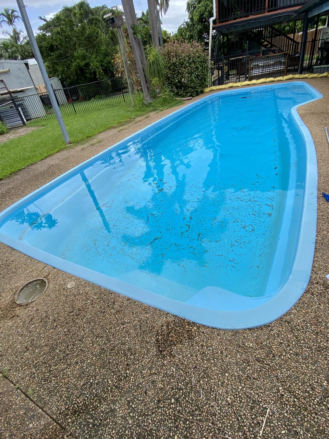 Aerial view of a clean blue Townsville pool after a fortnightly Basic Pool Service